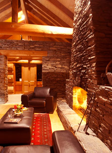 The lounge has a large stone fireplace
